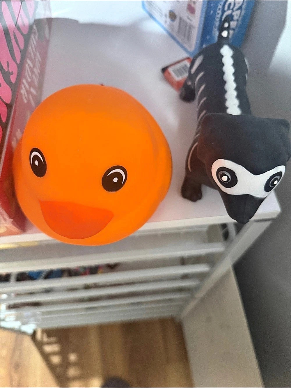 Squeeezys  Orange Duck & Black Animal Plush Toys